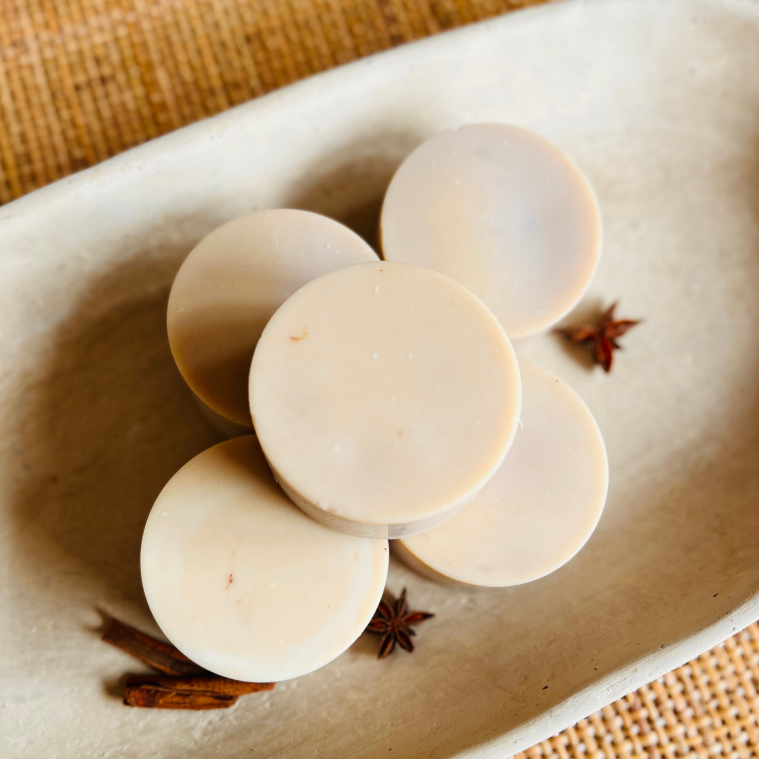 Cinnamon and frankincense scented dish soap bar showing natural cocoa-tinted color